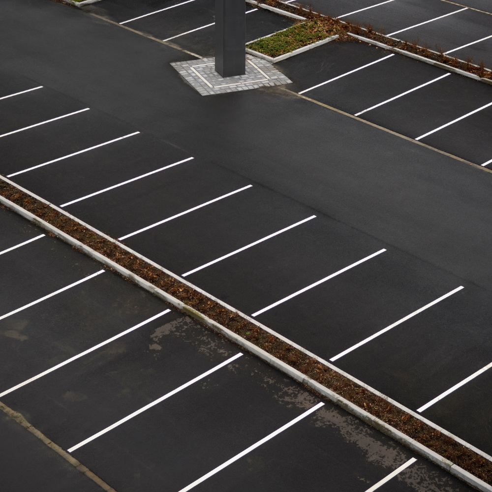 skid steer parking lot paving
